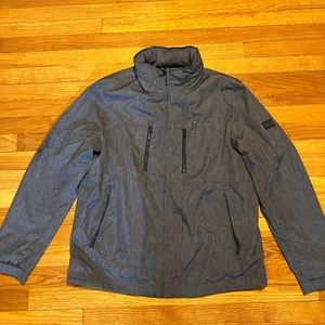Heathers blue Tommy Hilfiger rain jacket/windbreaker.